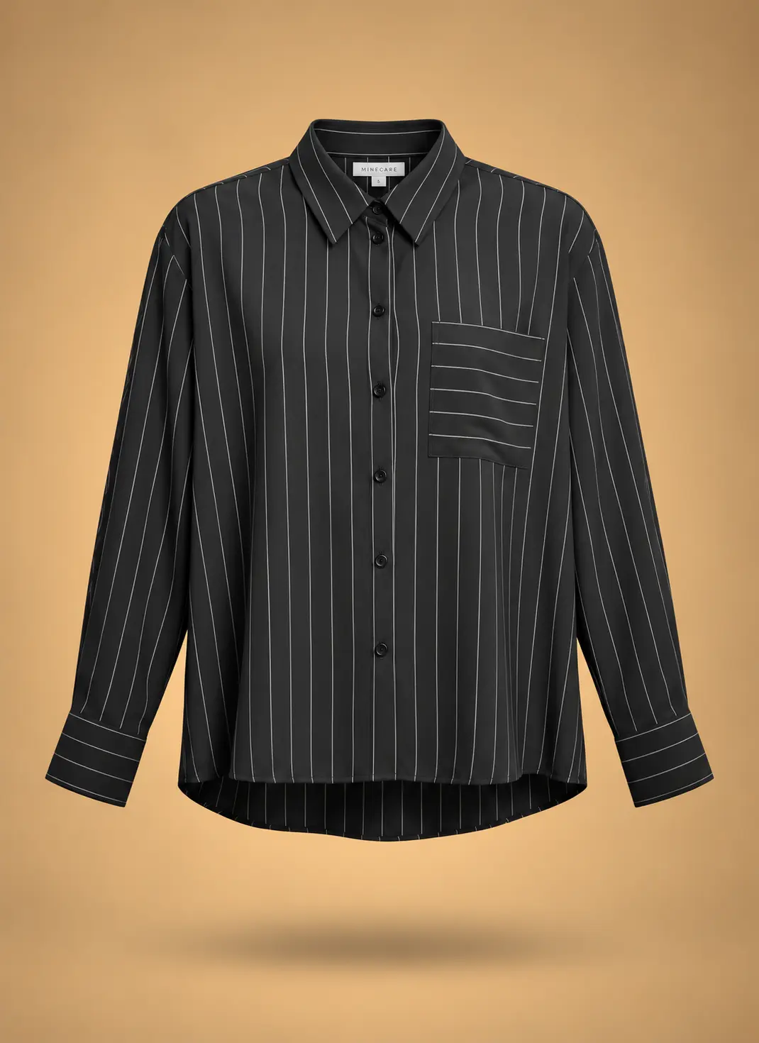 Black women's long-sleeve button-down shirt with fine white pinstripes, pointed collar, contrast-stripe chest pocket and cuffs
